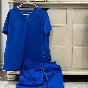 Healing hands scrubs. Top is the “Skyler” XL. Joggers are the “NAYA” size M